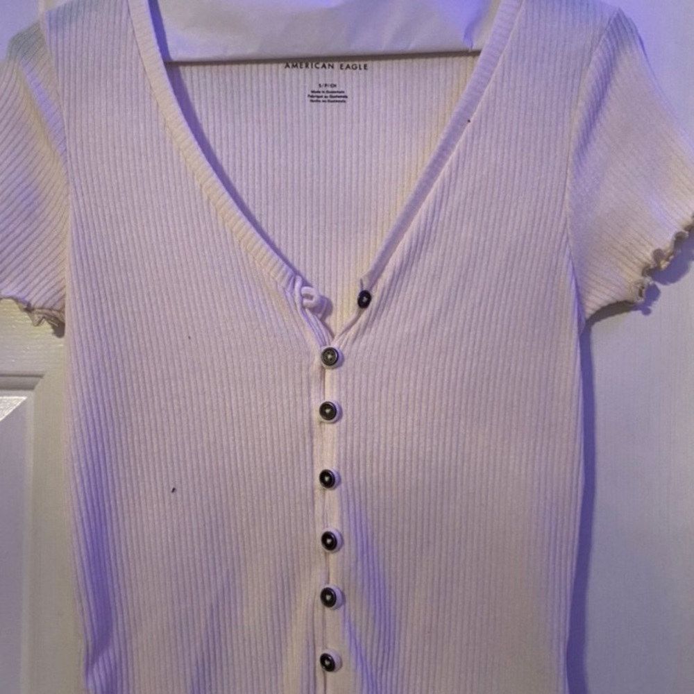 american eagle button down white frilly shirt